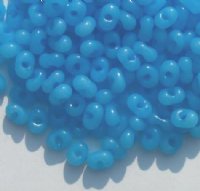 25 grams of 3x7mm Milky Blue Farfalle Seed Beads